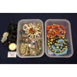 Two boxes of vintage costume jewellery including a graduated agate bead necklace. (B.P. 21% + VAT)
