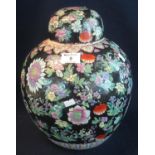 Modern Chinese porcelain large black ground floral decorated ginger jar and cover. Square seal