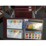 Great Britain collection of First Day Covers and Presentation Packs in four Royal Mail albums 2000