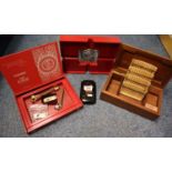 Assorted smoking ephemera to include; various cigar cutters, a wooden cigar box, a wooden