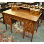 Edwardian oak knee hole desk having gallery top with three drawers to each pedestal and Art