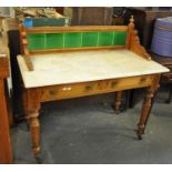 Edwardian pine tiled back marble top wash stand on tapering turned legs and castors. (B.P. 21% +
