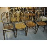 Set of six early 20th century elm wheel and spindle back farmhouse kitchen chairs. (6) (B.P. 21% +