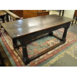 17th Century style oak refectory table having three plank cleated top above arcade frieze