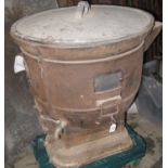 Unusual metal pedestal cauldron with lid and large spout, having appearing copper liner and with