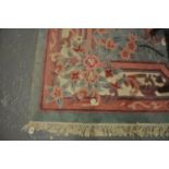 Large Chinese wash ground floral and foliate carpet. (B.P. 21% + VAT)