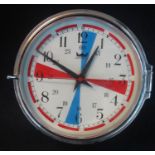 An Astra chrome finish wall clock with blue and red quadrants to the white Arabic face. Modern