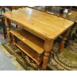 Modern pine rectangular kitchen table, together with a similar pine coffee table with under-tier. (