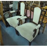 Pair of Edwardian mahogany inlaid armchairs with padded back and arms and upholstered seat on