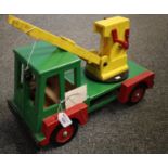 A wooden toy model of a four wheeled Crane, painted finish, made by John C Davies, Hakin, Milford