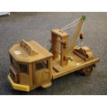 Well made hardwood toy model of a 'Hakin Road Tug' with crane and winch. Made by John C Davies of