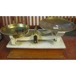 Set of Fairbanks Birmingham shop scales with brass pans, weights and marble top. (B.P. 21% + VAT)