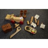 A box containing a collection of modern treen items including; a toy hippo, drinking cups on