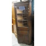 20th Century carved oak single door lead glazed corner cabinet. (B.P. 21% + VAT)