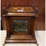 19th Century oak gothic design two train mantel clock having brass face with silvered chapter