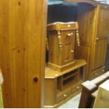 Collection of pine furniture to include; twin section wardrobe, corner unit, TV unit, corner