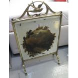 Early 20th Century brass fire screen with swallow and hand painted floral decoration. (B.P. 21% +