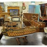 A kit built wooden scale model of a 17th Century three decker three masted man o'war. 1M long