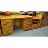 Modern pine twin pedestal desk, together with a pine TV unit and a pine single door glazed