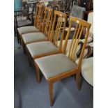 Four modern beech slat back dining chair with drop in seats. (4) (B.P. 21% + VAT)
