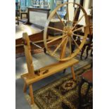 A modern beech large spinning wheel or walking wheel, on trestle base. (B.P. 21% + VAT)