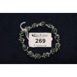 Jade bracelet set in white metal. (B.P. 21% + VAT)