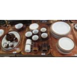 Six trays of Poole pottery oven to tableware, coffee and dinnerware items on a white and brown