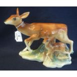 Dutch pottery group of a doe with fawn, on naturalistic base with plastic horns, impressed marks