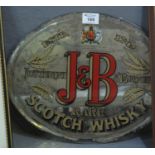 An oval printed advertising mirror with bevel plate, for Justerini & Brooks, J & B rare Scotch