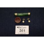 9ct gold and jade brooch, a pair of cultured pearl studs and a fob (3). (B.P. 21% + VAT)