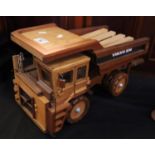 Well made hardwood model of a Volvo BM Dump Truck, made and exhibited by John C Davies of Hakin,