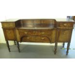Victorian Scottish mahogany break front sideboard, having raised back with two blind cupboards