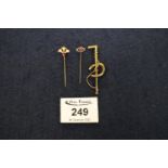 Victorian fan shaped stick pin set with ruby and pearls, a ruby set stick pin and a horseshoe
