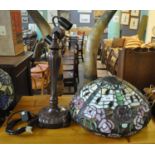 Large modern Tiffany style table lamp, the multi-coloured shade decorated with roses. (B.P. 21% +