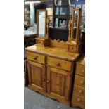 Modern pine triple mirror back dressing table/cupboard. (B.P. 21% + VAT)