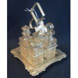 Edwardian silver plated four bottle cruet set, the bottles pillar cut glass. (B.P. 21% + VAT)