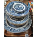 Tray of 19th Century willow blue and white transfer printed items to include; plates and oval meat