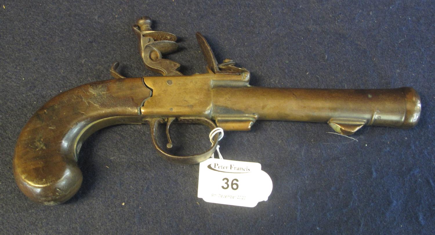 18th Century brass barrelled muzzle loading flintlock blunderbuss pistol, having 13cm cannon mouthed