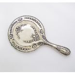 Silver Art Deco hand mirror.