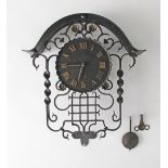 Wrought iron wall clock.