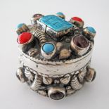 Jeweled silver pill box.