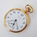 Gold pocket watch.