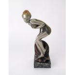 Art Deco metallic figure.