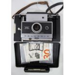 A Polaroid Automatic 250 camera.