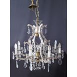 An eight light crystal chandelier. W80cm.