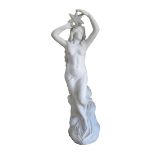 Garden Statuary: A reconstituted marble Venus of sea holding a star fish over her head. H87cm.