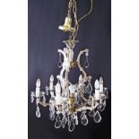 A six light crystal chandelier. W70cm.
