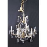 A six light crystal chandelier. W70cm.