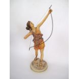 A vintage resin figurine of Diana / Artemis Godess of the Hunt, as an archer, H66cm.