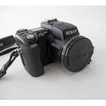Nikon Digital camera COOLPIX 8700, the lens 8xzoom ED 8,0 Mega Pixels. Missing the charger.